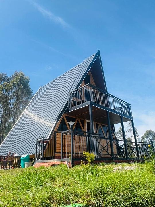 The A-frame under blue skies at Misty Meadows